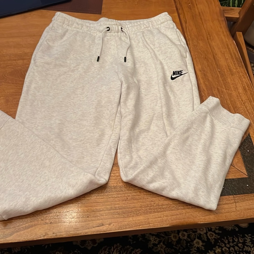 Grey & white Nike joggers. Size medium